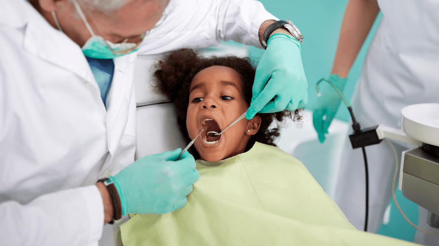 Child getting dental fillings
