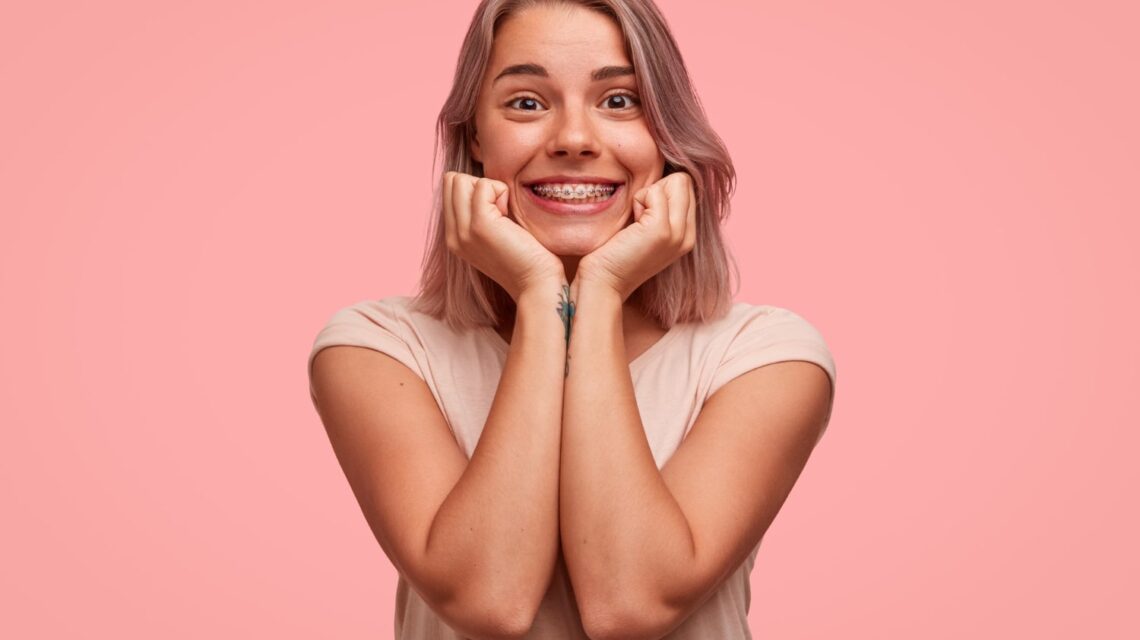 Teenager with braces excited