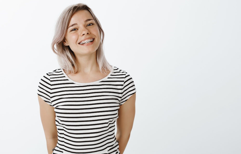 Cute blonde girl posing in the studio