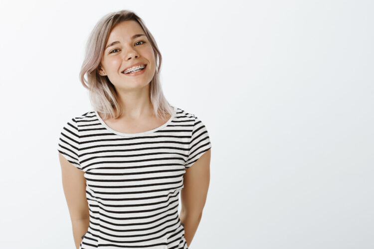 Cute blonde girl posing in the studio